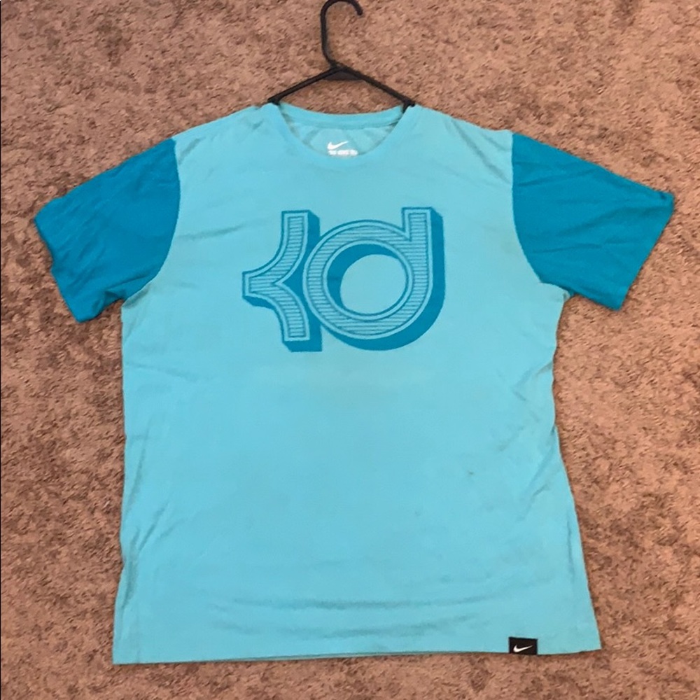 Blue Nike tee